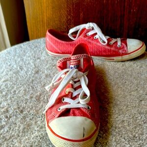Light red Converse low top sneakers